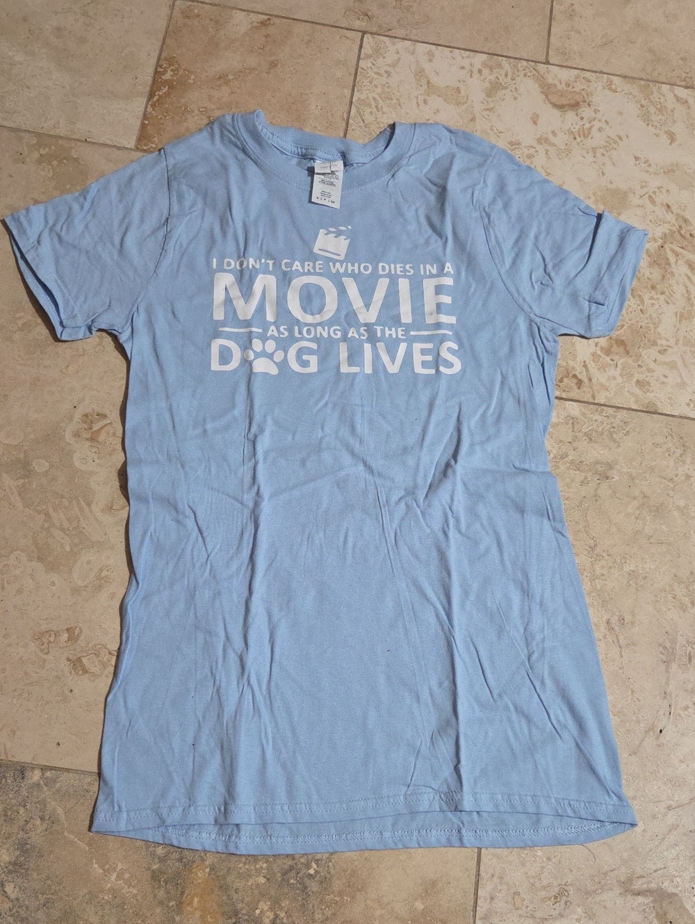 🐶 Gildan Softstyle Small Light Blue T-Shirt – “I Don’t Care Who Dies in the Mov